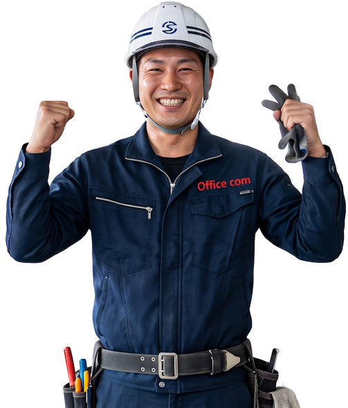 ガッツポーズをする作業員